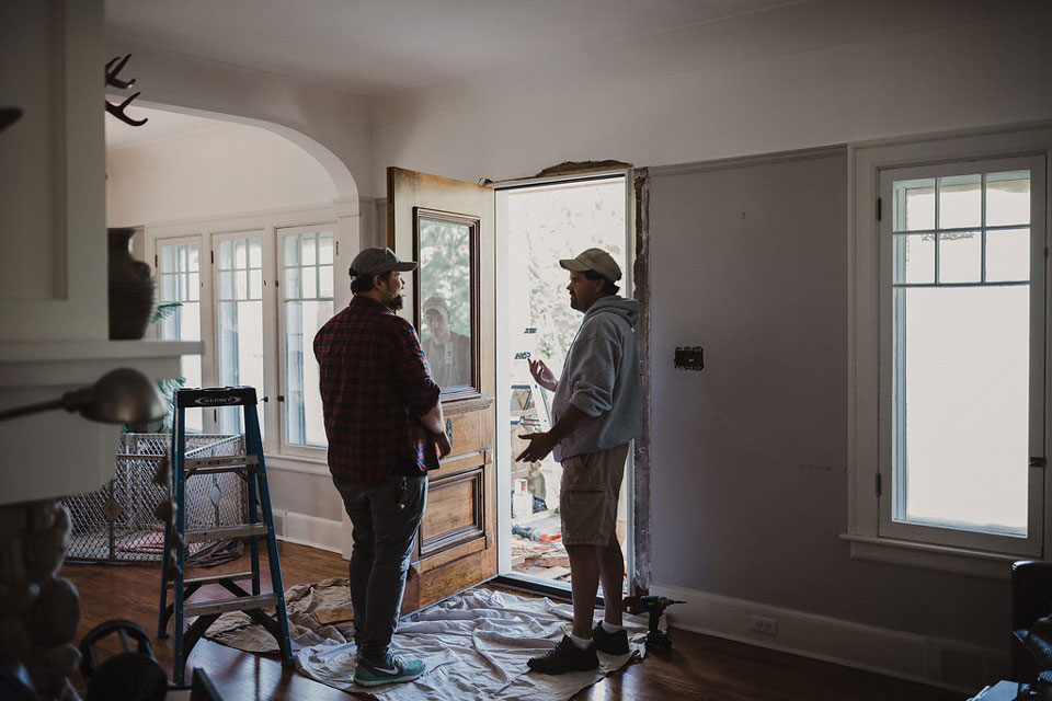 remodeling contractor and homeowner talking