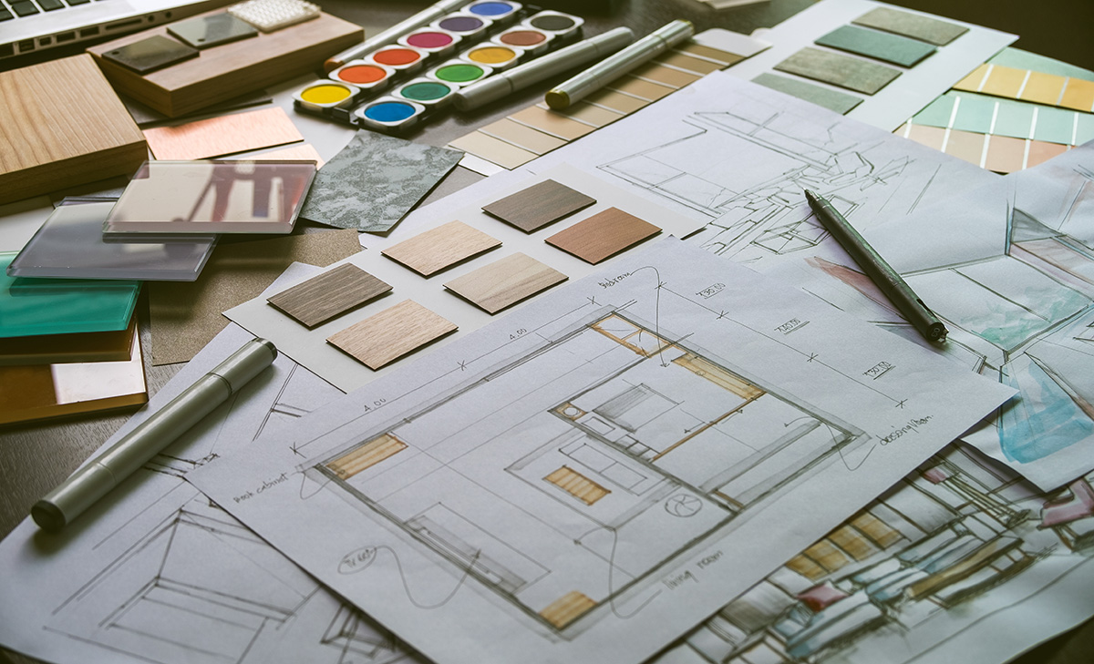 Architect designer Interior creative working hand drawing sketch plan blue print.